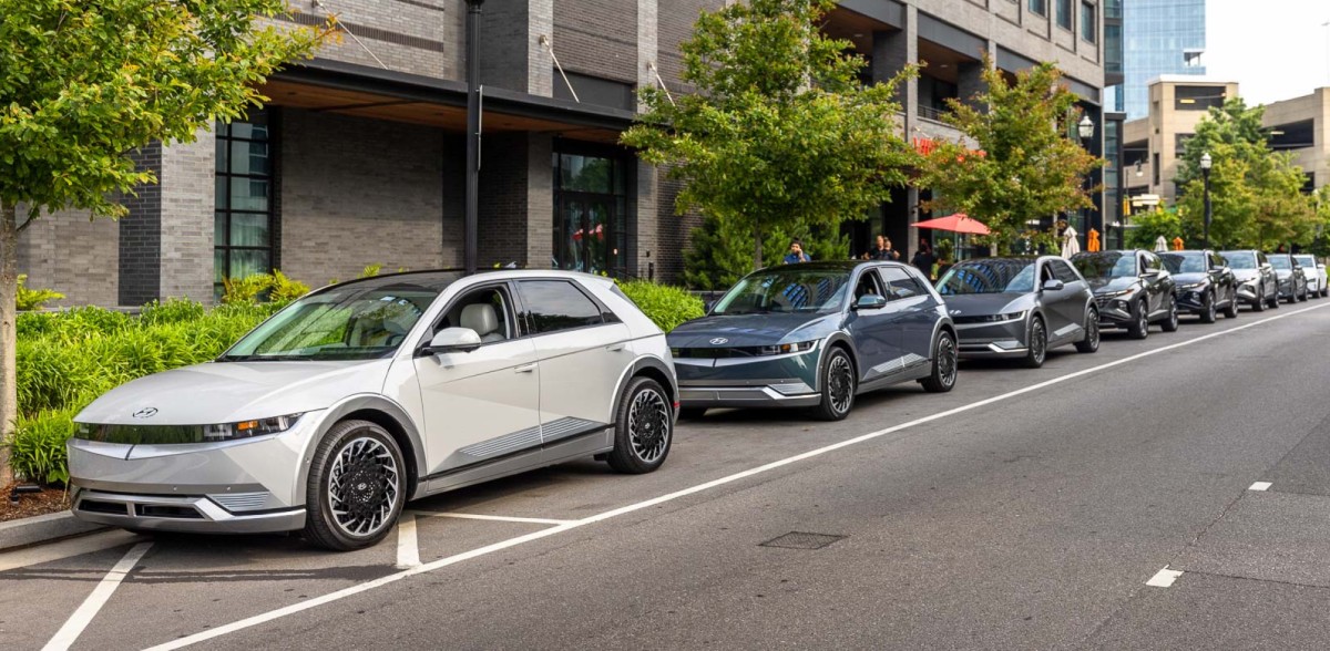 2024 Hyundai IONIQ 5 electric SUVs parked on a city street.