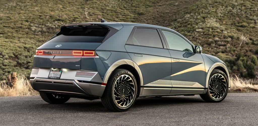 Rear side view of a 2024 Hyundai IONIQ 5 parked on a street.