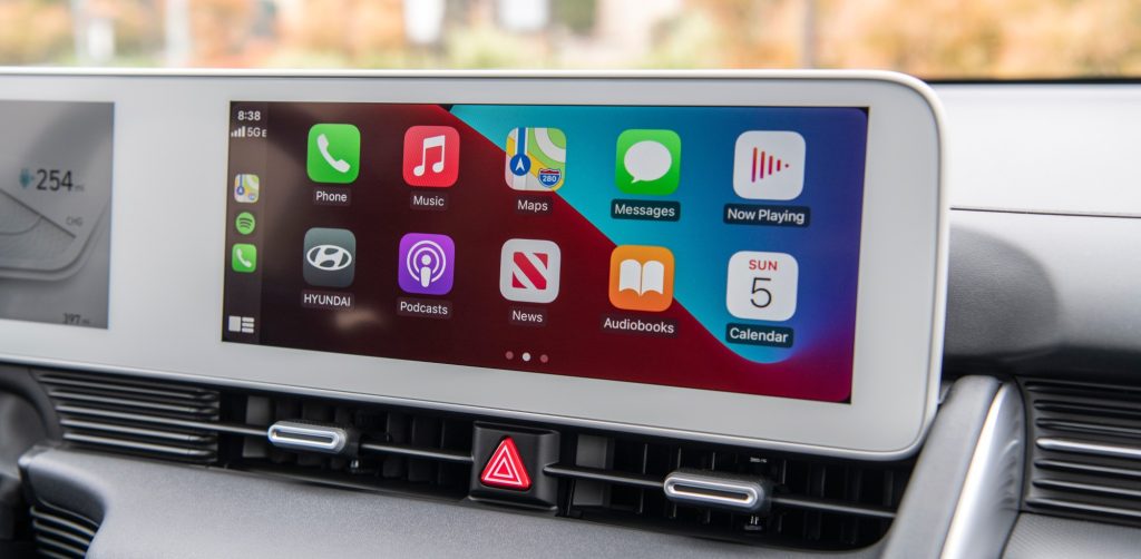 Interior front dash display showing Apple CarPlay.
