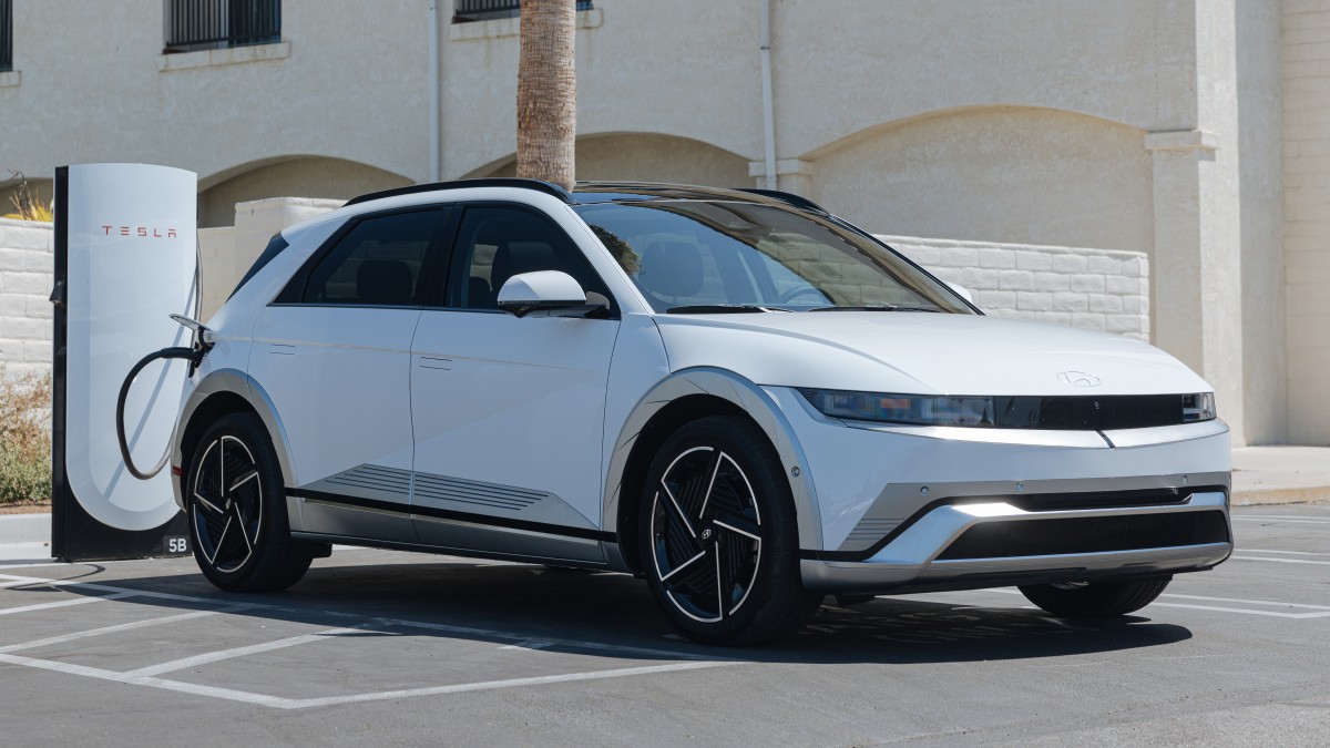 2025 IONIQ 5 Limited plugged into a Tesla charger