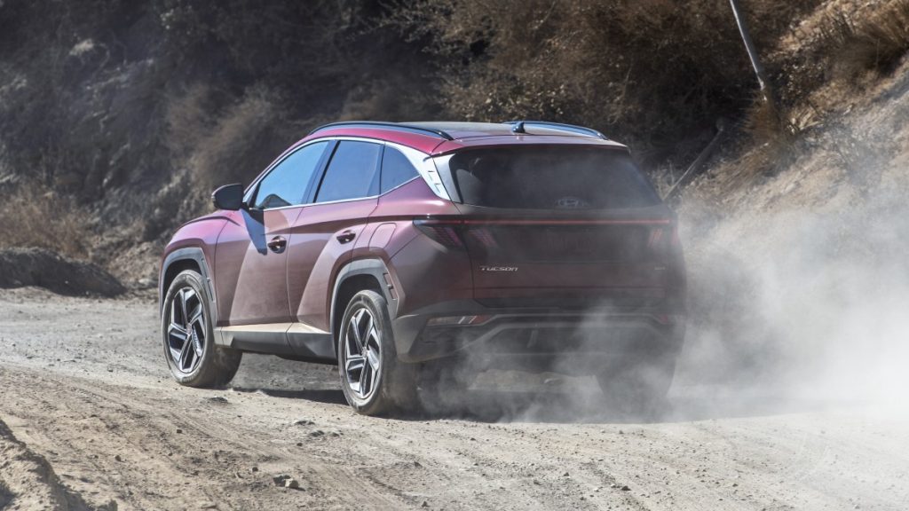 2024 Hyundai Tucson Red Rear view driving off-road