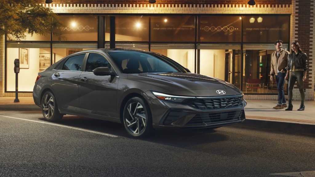 2025 Elantra Hybrid driving in a metro city