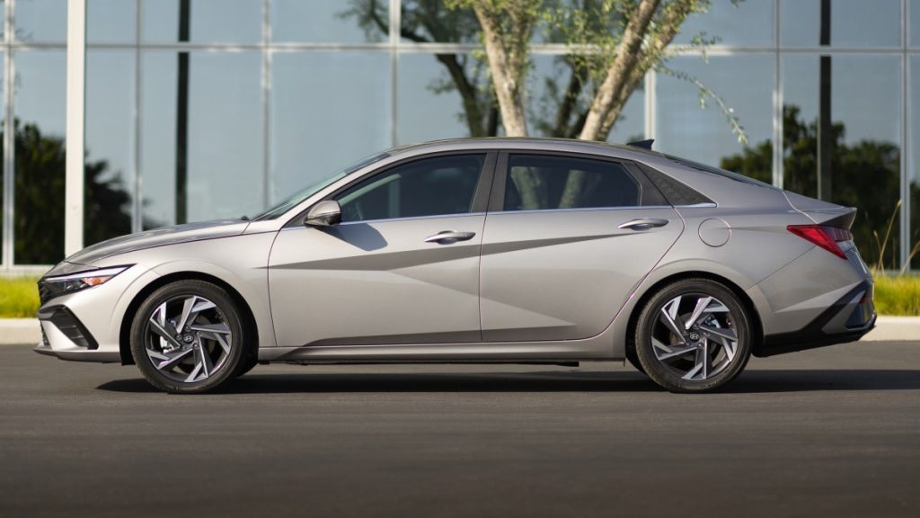 2025 Hyundai Elantra side view parked in front of a building