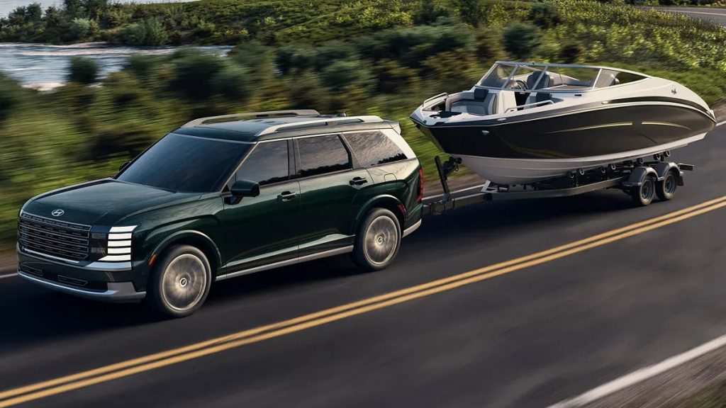 20026 Hyundai Palisade towing a boat.