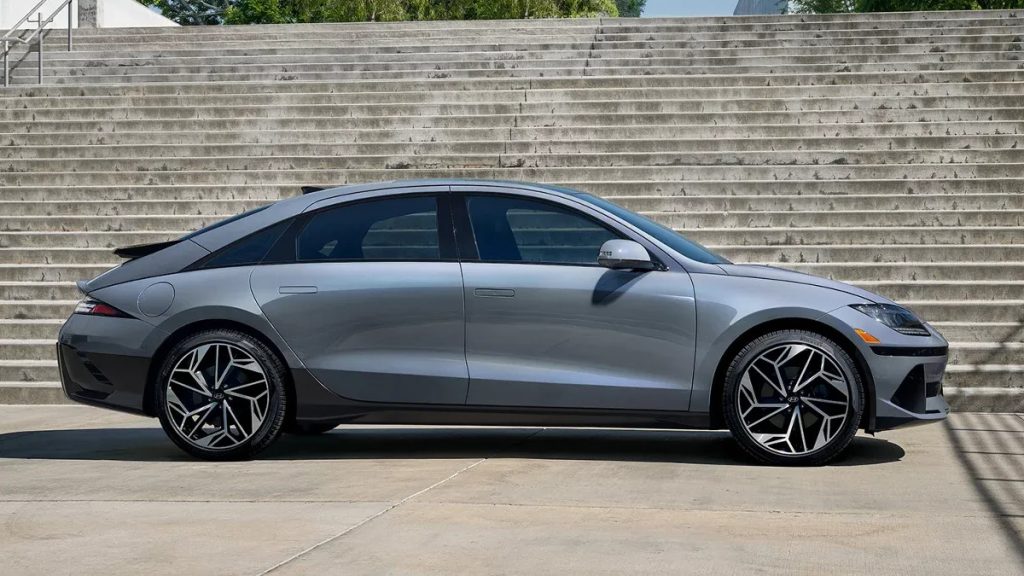 Side view of a 2026 Hyundai IONIQ 6 parked on a city street.