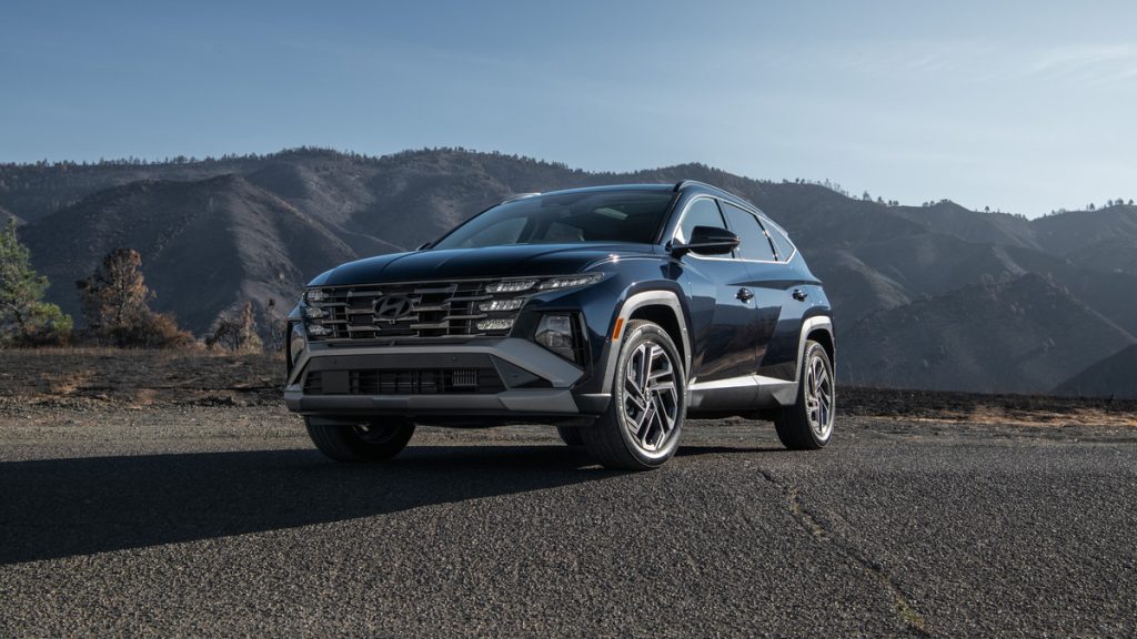 Front side hero view of a parked 2026 Hyundai Tucson Hybrid.